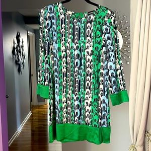 Ladies silk blouse by Bebe size small green and blue